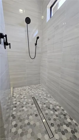 Bathroom featuring a stall shower