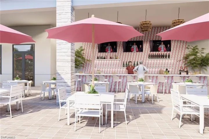 Outdoor patio area featuring patterned tile flooring, a built-in bar with white countertop, and integrated shelving