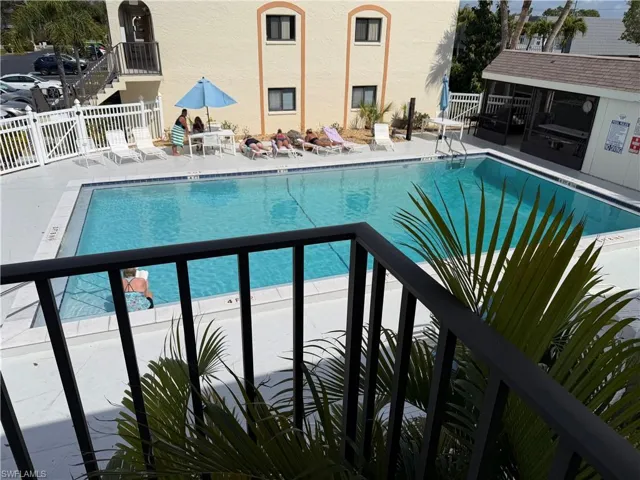 Community pool featuring a patio area