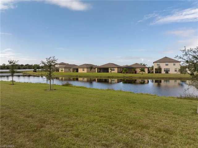 Water view with nearby suburban area