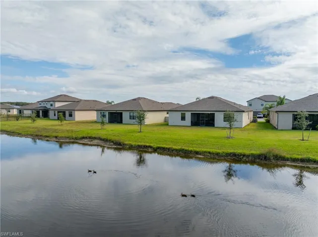 Water view featuring nearby suburban area