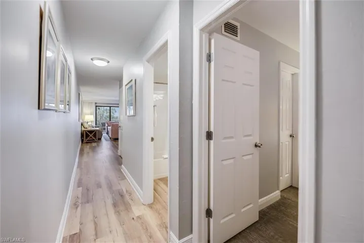 Hallway featuring light hardwood / wood-style floors