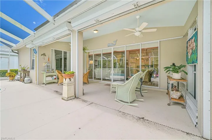 View of patio featuring ceiling fan