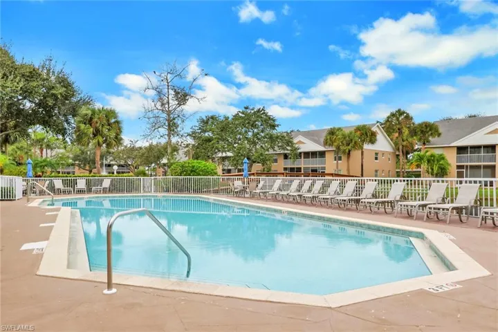 Community pool featuring a patio area