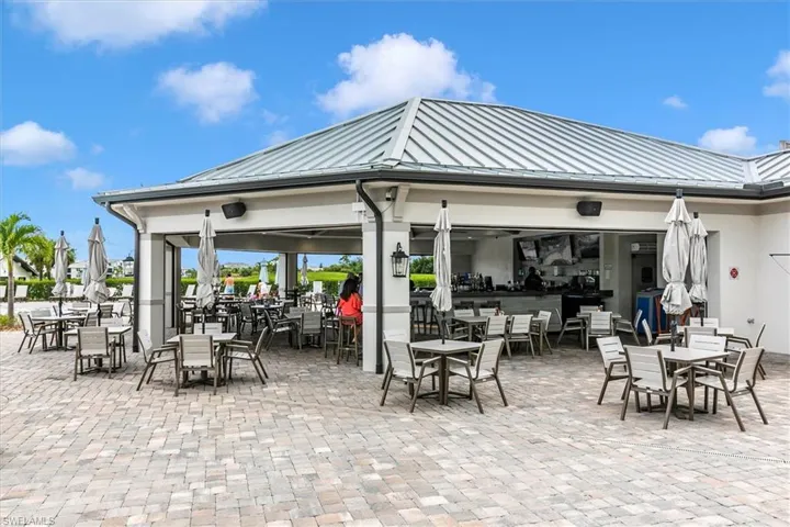View of patio with outdoor dining area