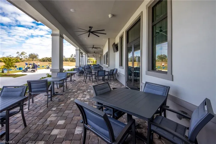 View of patio / terrace with outdoor dining space and ceiling fan