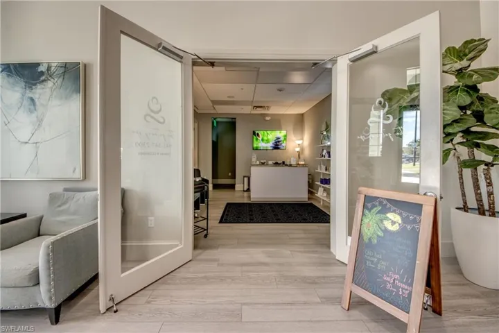 Foyer entrance featuring light wood finished floors