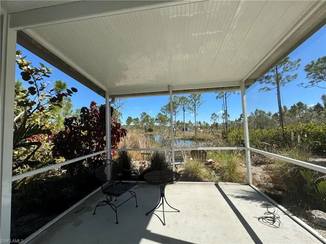 Sunroom with a water view