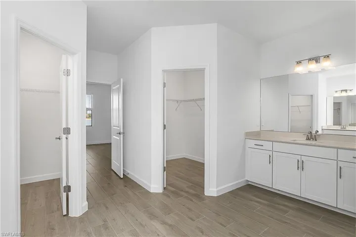 Plenty of closet space with his/her closets.