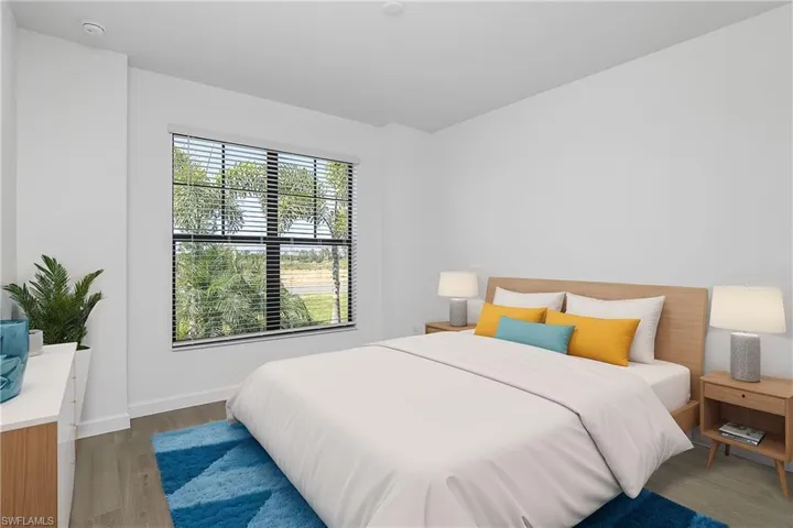 Guest bedroom at front of the home. (furnishings digitally staged)