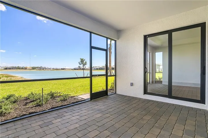Screened lanai provides gorgeous water views. Plenty of room to add your own custom pool.