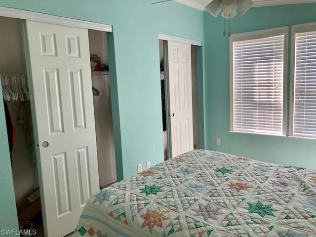 Bedroom featuring a closet and ornamental molding