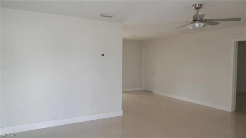 Bathroom featuring vanity and a stall shower