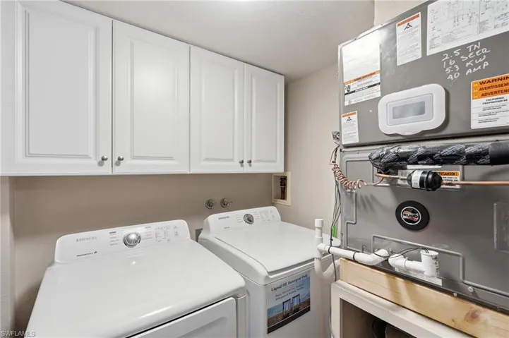White shaker-style upper cabinetry - Virtually Edited Image