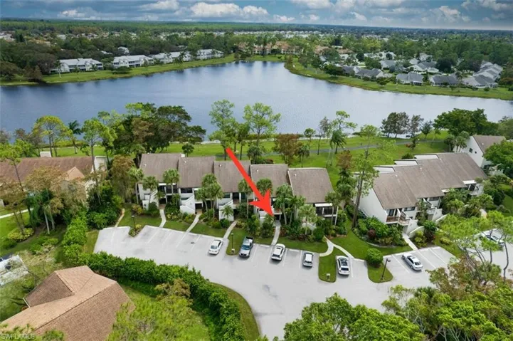 Bird's eye view with a water view and a residential view