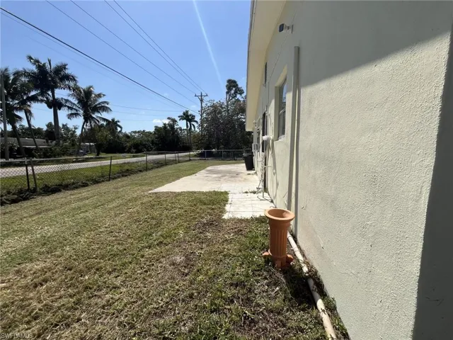 View of yard featuring a patio and a fenced backyard
