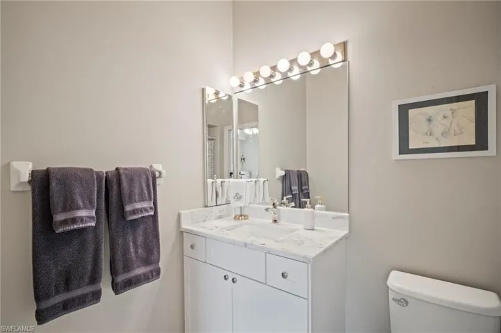 Full bathroom featuring vanity and a shower with shower curtain