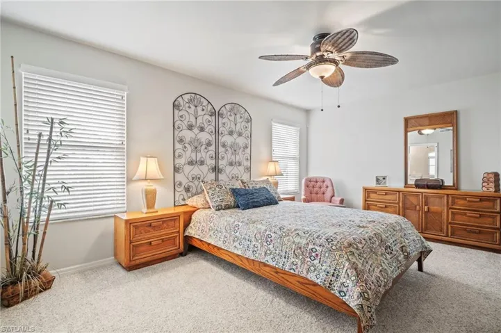 Bedroom with carpet floors and ceiling fan