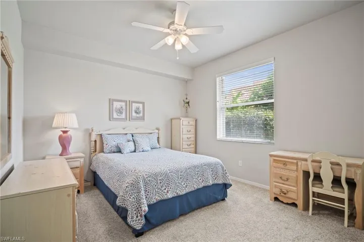 Bedroom with carpet floors and ceiling fan