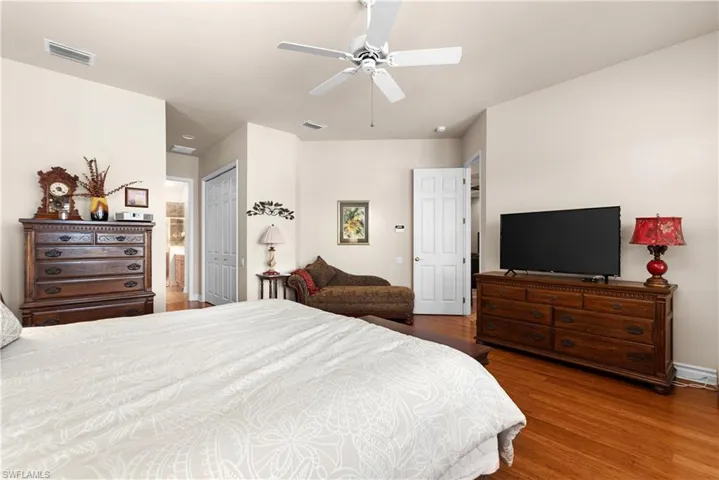 PRIMARY BEDROOM...WOOD FLOORS