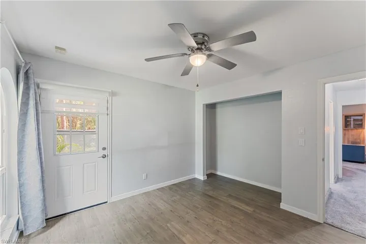 3rd bedroom with laminate flooring and separate entrance