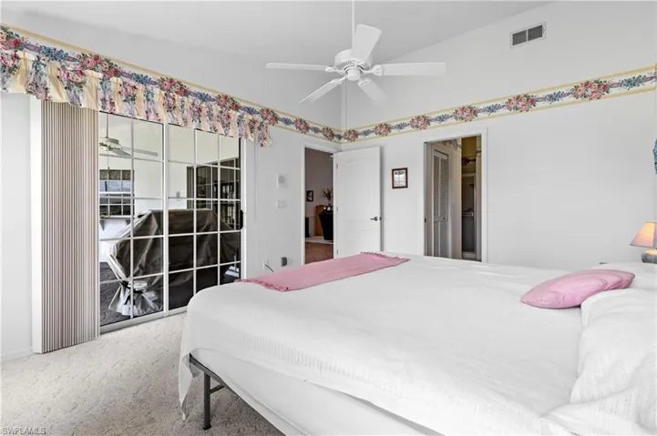 Bedroom with carpet and a ceiling fan