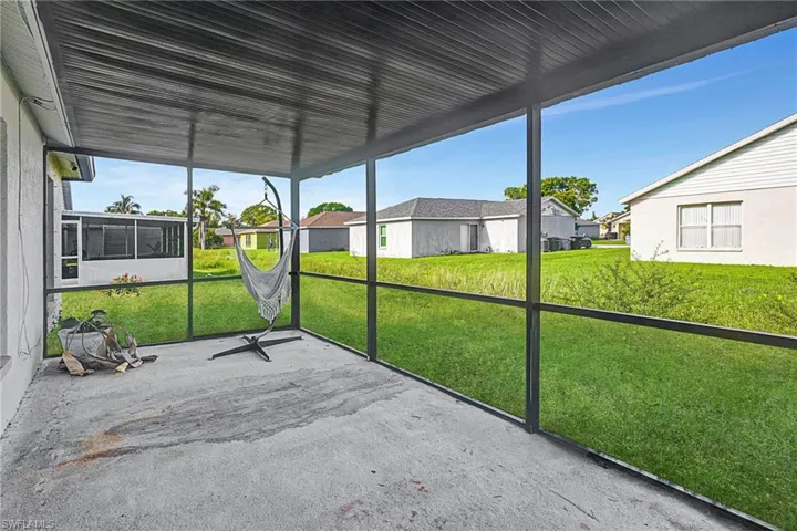 Unfurnished sunroom with a residential view