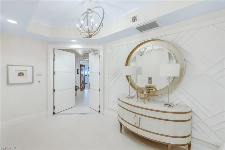 Leave and enter through a beautifully appointed elevator lobby.