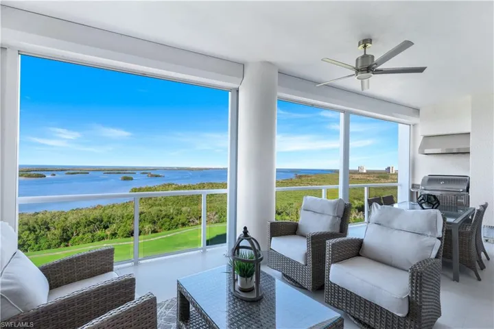 You'll be impressed by this stunning home overlooking the sparkling water. Notice the GAS grill on your private lanai.