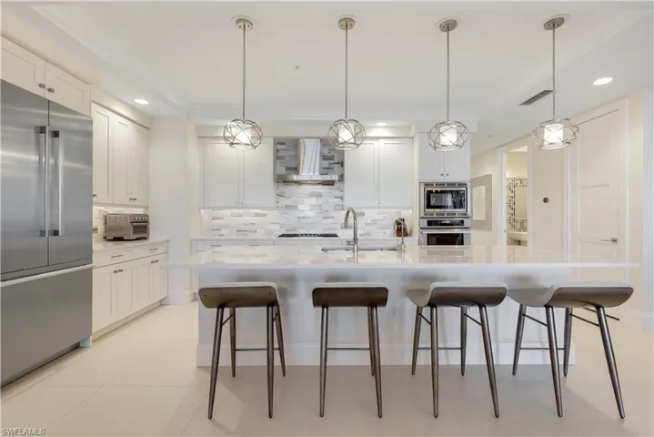 Welcome to your luxurious new home in the esteemed building of Seaglass in Bonita Bay!