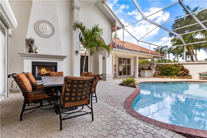 Enjoy meals out in your courtyard! A fabulous fireplace for those cool Florida nights!