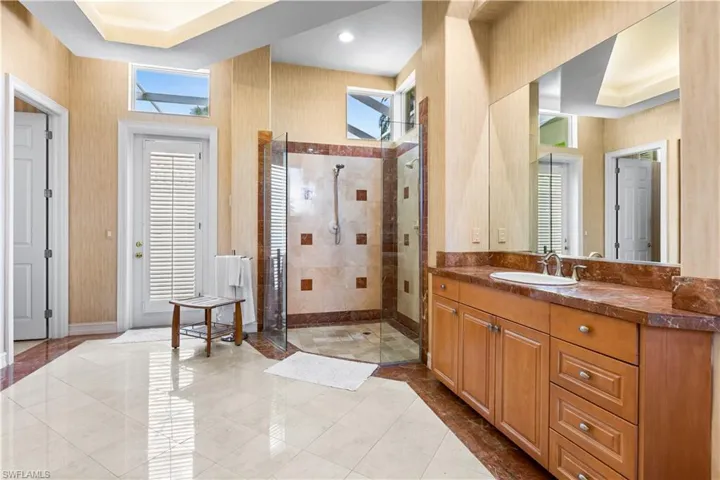 Your master bath has access to your courtyard area and pool/spa.  All private.