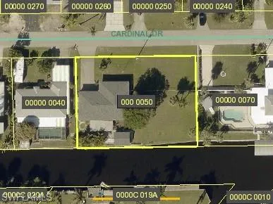 Aerial overview of property's location featuring property parcel outlined