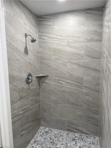 Bathroom with tiled shower