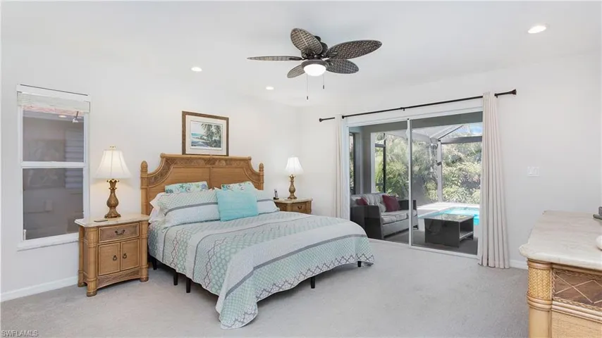 Bedroom featuring access to outside, light colored carpet, recessed lighting, and ceiling fan
