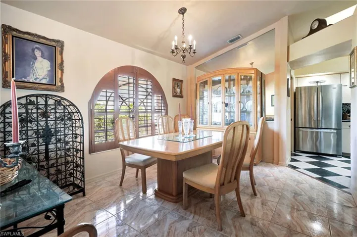 Dining space with vaulted ceiling