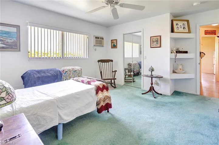 2nd Bedroom with large walk-in closet, and ceiling fan