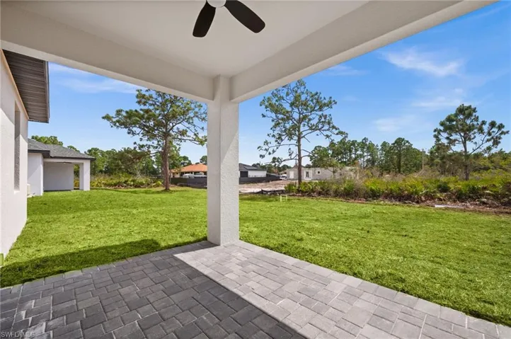 View of patio with ceiling fan