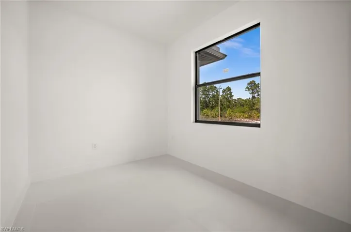 Spare room with baseboards