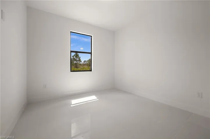 Empty room with baseboards