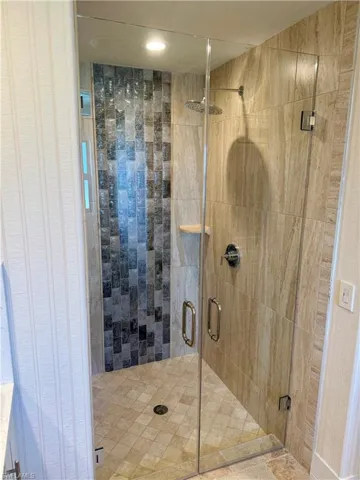 Full bath featuring a stall shower