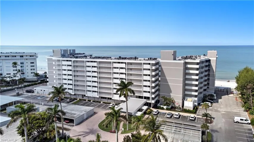 View of apartment building / complex with a water view