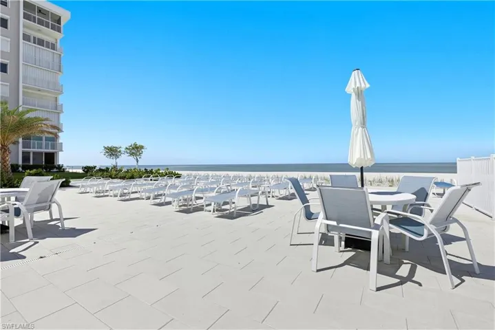 View of patio / terrace with a water view