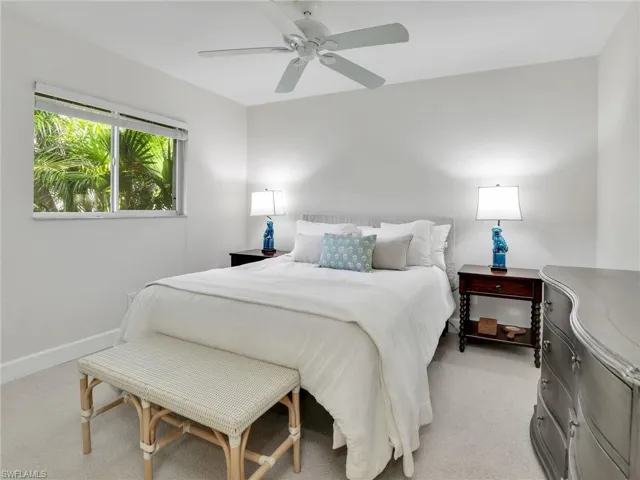 Another guest bedroom w/ landscaped view