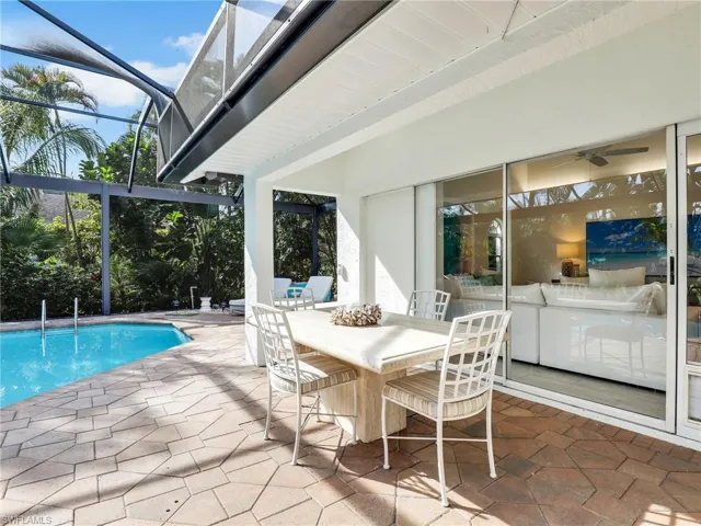 Covered lanai with sliders to the living area