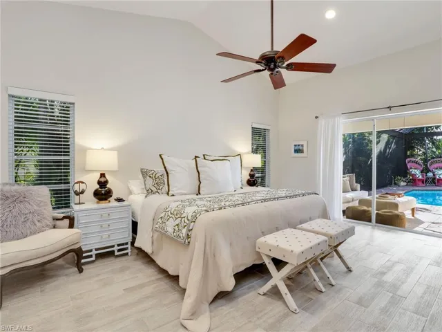 Primary suite with lots of windows & sliders to the lanai