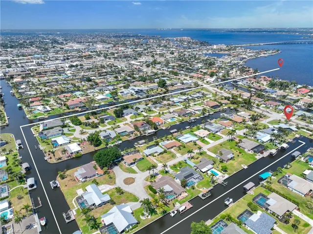 Bird's eye view with a residential view and a water view