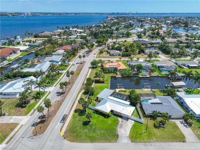 Drone / aerial view featuring a residential view and a water view