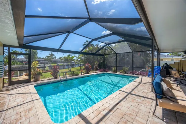 Pool with a patio area