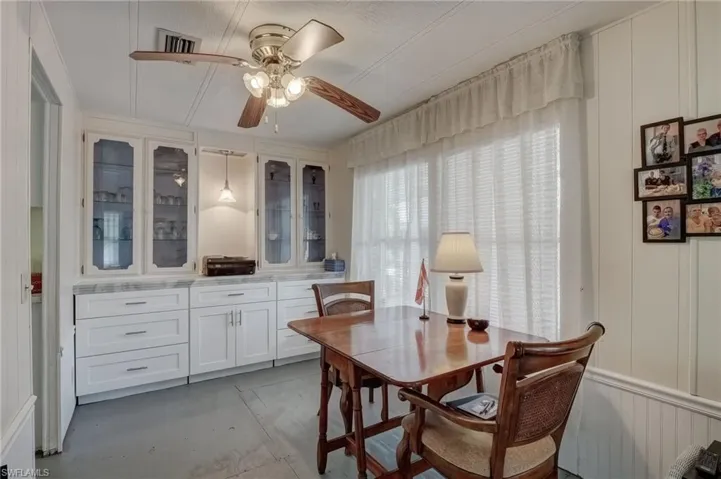 Dining room with a ceiling fan